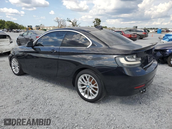 2015 BMW 2 Series 228i with VIN WBA1F5C5XFV256016, listed as a Copart auction lot 62587715 with 120,651 mi miles and Clean title. Bid and sale history available at DreamBid. Image 2.
