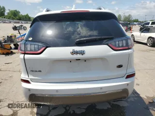2019 Jeep Cherokee Overland with VIN 1C4PJMJN3KD123879, listed as a Copart auction lot 57650905 with 77,962 mi miles and Salvage title. Bid and sale history available at DreamBid. Image 6.