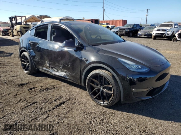 2022 Tesla Model Y Long Range z VIN 7SAYGDEE2NF391349, wystawiony jako Copart lot #85351924 z przebiegiem 5 670 mil mil oraz Szkoda całkowita • Salvage title. Historia ofert i sprzedaży dostępna na DreamBid. Obrazek 4.