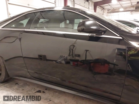 2011 Cadillac CTS Performance z VIN 1G6DL1ED3B0100075, wystawiony jako IAAI lot #41392627 z przebiegiem 124 775 mil mil oraz . Historia ofert i sprzedaży dostępna na DreamBid. Obrazek 13.