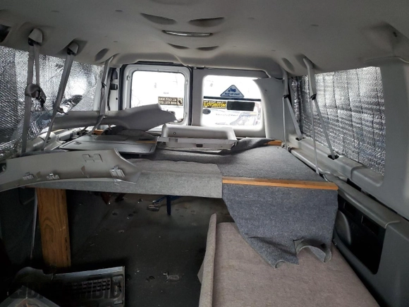 2011 Ford Econoline Passenger XL with VIN 1FBNE3BL8BDA53030, listed as a Copart auction lot 69919024 with 196,386 mi miles and Salvage Title. Bid and sale history available at DreamBid. Image 10.