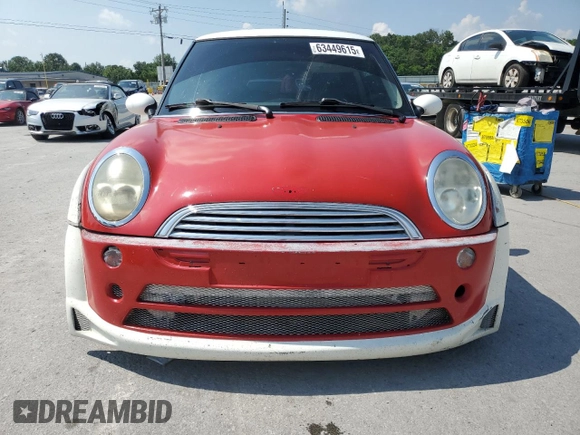2004 MINI Hardtop with VIN WMWRC33444TC50103, listed as a Copart auction lot 63449615 with 144,467 mi miles and Salvage title. Bid and sale history available at DreamBid. Image 5.