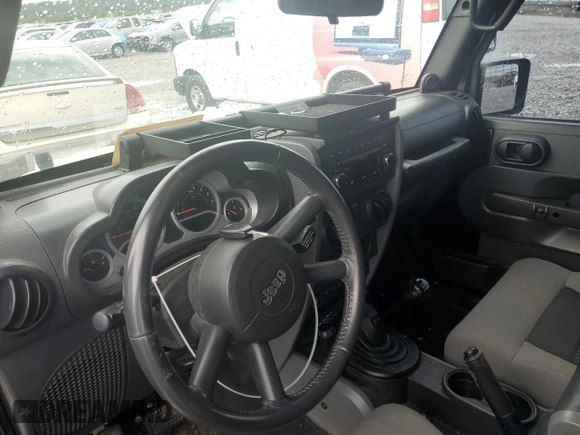 2010 Jeep Wrangler Rubicon with VIN 1J4BA6D14AL198524, listed as a Copart auction lot 65260235 with Not provided miles and Clean title. Bid and sale history available at DreamBid. Image 9.