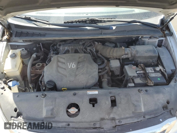 2012 Kia Sedona LX with VIN KNDMG4C72C6445242, listed as a Copart auction lot 54164455 with 143,124 mi miles and Salvage Title. Bid and sale history available at carsss.com. Image 12.