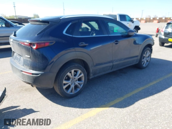 2024 Mazda CX-30 2.5 S Carbon Edition with VIN 3MVDMBCMXRM604020, listed as a IAAI auction lot 42042155 with 24,545 mi miles. Bid and sale history available at carsss.com. Image 4.