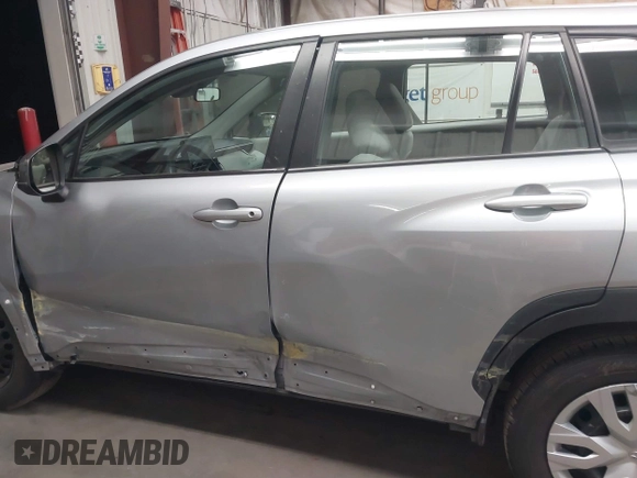 2022 Toyota Corolla Cross L with VIN 7MUAAABGXNV034491, listed as a IAAI auction lot 41905895 with 67,252 mi miles and . Bid and sale history available at DreamBid. Image 14.