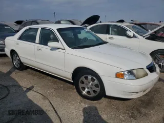 2000 Mazda 626 LX with VIN 1YVGF22C3Y5102174, listed as a Copart auction lot 75287594 with 0 mi miles and Non Repairable. Bid and sale history available at carsss.com. Image 4.