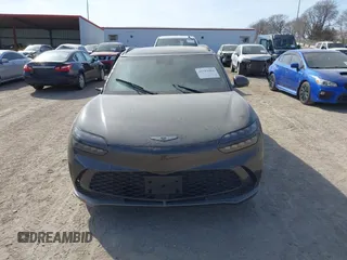 2024 Genesis GV60 z VIN KMUKEDSBXRU021487, wystawiony jako IAAI lot #41593903 z przebiegiem 10 961 mil mil oraz . Historia ofert i sprzedaży dostępna na DreamBid. Obrazek 12.