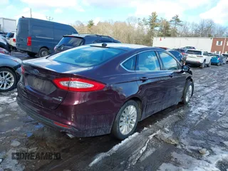 2013 Ford Fusion SE Hybrid z VIN 3FA6P0LU1DR251738, wystawiony jako IAAI lot #41576698 z przebiegiem 158 735 mil mil oraz . Historia ofert i sprzedaży dostępna na DreamBid. Obrazek 4.