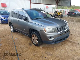 2014 Jeep Compass Sport with VIN 1C4NJCBA9ED594548, listed as a IAAI auction lot 41953586 with 194,593 mi miles. Bid and sale history available at carsss.com. Image 1.