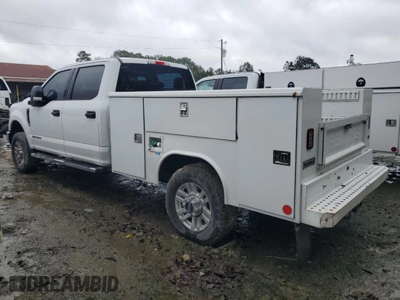 2019 Ford F-350 with VIN 1FD8W3BT8KEF59372, listed as a Copart auction lot 57202484 with 216,006 mi miles and Salvage title. Bid and sale history available at DreamBid. Image 2.