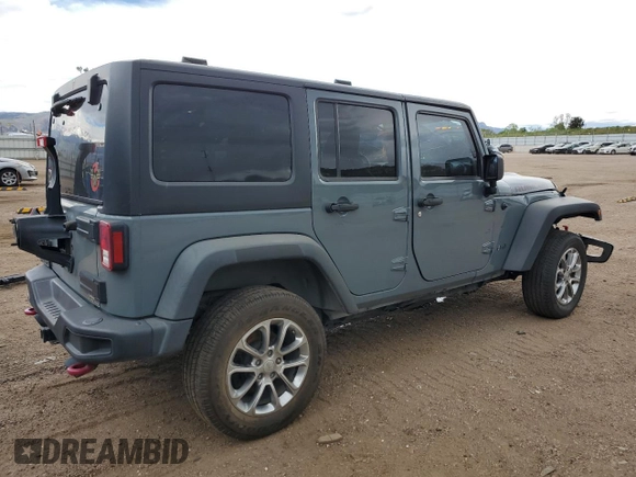 2014 Jeep Wrangler Unlimited Rubicon z VIN 1C4HJWFG0EL316513, wystawiony jako Copart lot #57182325 z przebiegiem 150 012 mil mil oraz Szkoda całkowita • Salvage title. Historia ofert i sprzedaży dostępna na DreamBid. Obrazek 3.