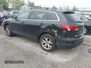2014 Mazda CX-9 Sport with VIN JM3TB3BV8E0437180, listed as a IAAI auction lot 42413844 with 177,393 mi miles and . Bid and sale history available at DreamBid. Image 3.
