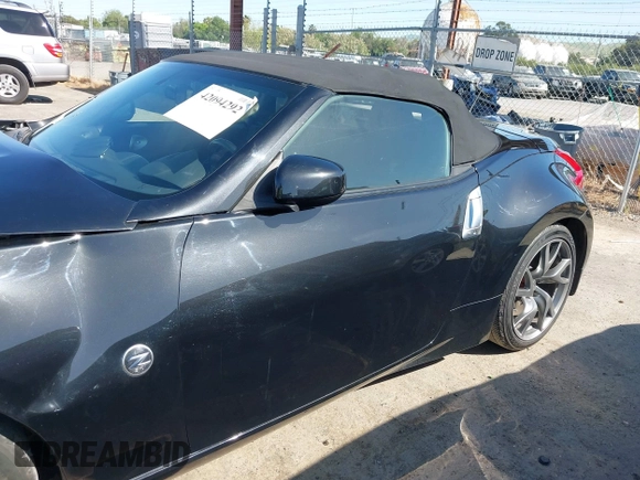 2014 Nissan 370Z Touring with VIN JN1AZ4FH8EM620208, listed as a IAAI auction lot 42094292 with 68,799 mi miles and . Bid and sale history available at DreamBid. Image 14.