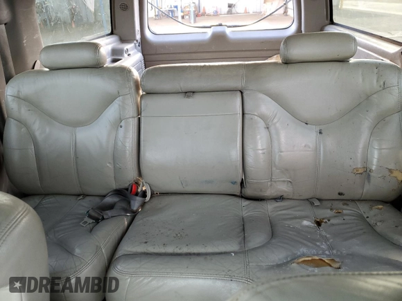 2002 GMC Yukon XL SLT z VIN 1GKFK16ZX2J232476, wystawiony jako Copart lot #50203045 z przebiegiem 285 792 mil mil oraz Szkody całkowita. Historia ofert i sprzedaży dostępna na DreamBid. Obrazek 10.