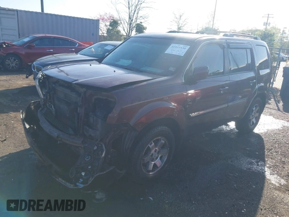 2011 Honda Pilot Touring z VIN 5FNYF4H9XBB040893, wystawiony jako IAAI lot #41933530 z przebiegiem 161 725 mil mil oraz . Historia ofert i sprzedaży dostępna na DreamBid. Obrazek 16.