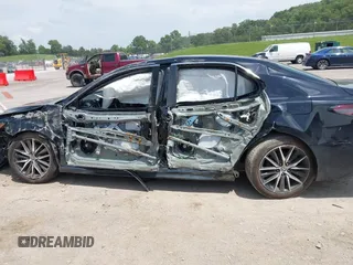 2023 Toyota Camry SE z VIN 4T1T11AK9PU721786, wystawiony jako IAAI lot #42279812 z przebiegiem 30 707 mil mil oraz . Historia ofert i sprzedaży dostępna na DreamBid. Obrazek 14.