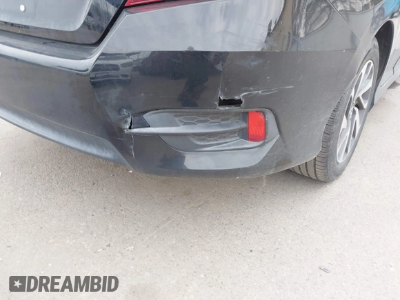 2018 Honda Civic EX with VIN 2HGFC2F75JH583892, listed as a IAAI auction lot 41697605 with 134,675 mi miles and . Bid and sale history available at DreamBid. Image 19.