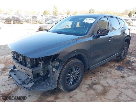 2020 Mazda CX-5 Touring with VIN JM3KFACM0L0754703, listed as a IAAI auction lot 41701734 with NaN miles. Bid and sale history available at carsss.com. Image 2.
