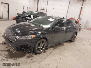 2020 Ford Fusion Hybrid Titanium with VIN 3FA6P0RU8LR141355, listed as a IAAI auction lot 41417807 with 61,288 mi miles. Bid and sale history available at carsss.com. Image 17.