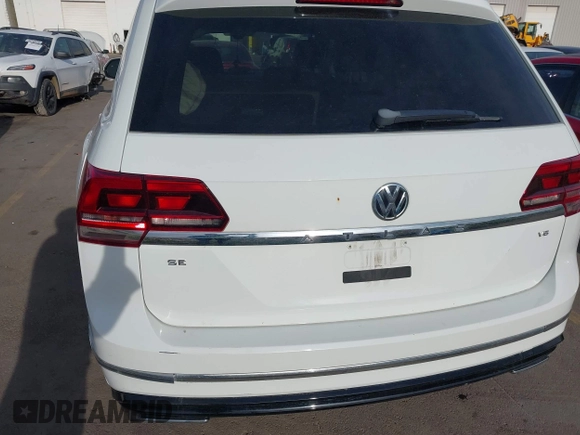 2018 Volkswagen Atlas SE z VIN 1V2FR2CA2JC540657, wystawiony jako IAAI lot #42115554 z przebiegiem 107 309 mil mil oraz . Historia ofert i sprzedaży dostępna na DreamBid. Obrazek 16.