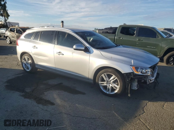 2015 Volvo V60 z VIN YV1612SB6F1211119, wystawiony jako Copart lot #77466004 z przebiegiem 144 388 mil mil oraz Szkoda całkowita • Salvage title. Historia ofert i sprzedaży dostępna na DreamBid. Obrazek 4.