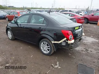2012 Chevrolet Sonic LT with VIN 1G1JC5SH0C4129096, listed as a IAAI auction lot 42023621 with 45,517 mi miles and . Bid and sale history available at DreamBid. Image 3.