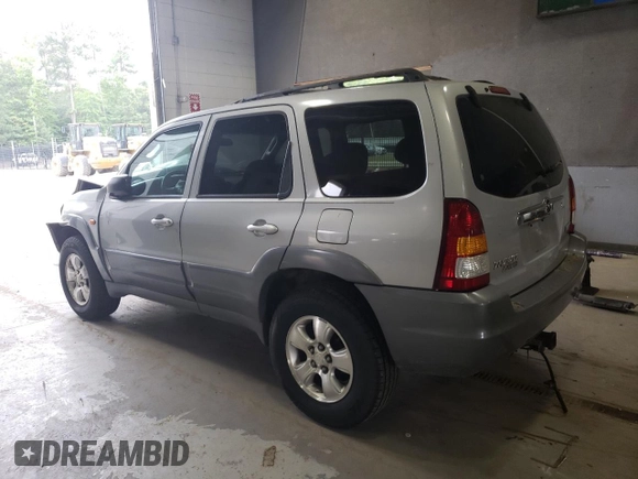 2001 Mazda Tribute LX with VIN 4F2CU08141KM65160, listed as a Copart auction lot 60895624 with 255,194 mi miles and Salvage Title. Bid and sale history available at DreamBid. Image 2.