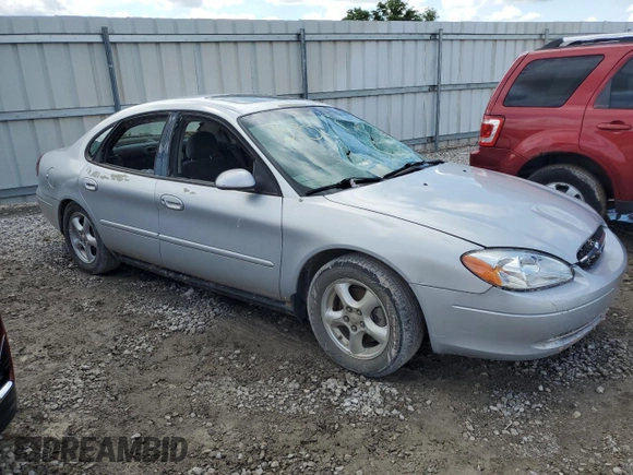 2002 Ford Taurus SES Standard with VIN 1FAFP55U02A115781, listed as a Copart auction lot 59007595 with 97,189 mi miles and Salvage title. Bid and sale history available at DreamBid. Image 4.