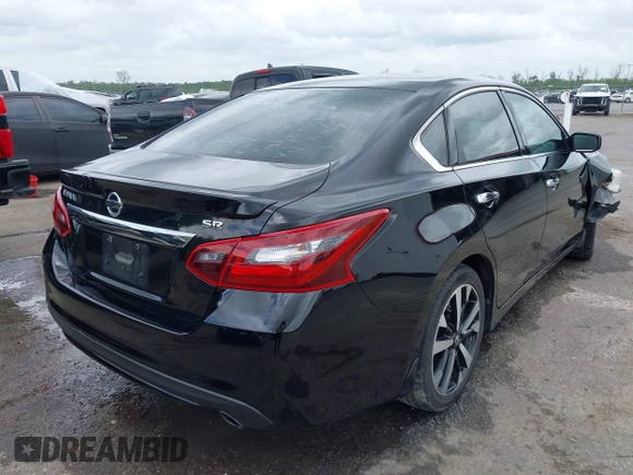 2018 Nissan Altima SR with VIN 1N4AL3AP5JC135313, listed as a IAAI auction lot 41964455 with 86,042 mi miles and . Bid and sale history available at carsss.com. Image 4.