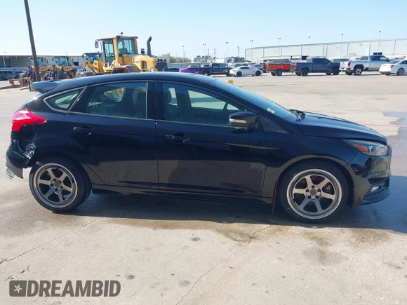 2018 Ford Focus ST with VIN 1FADP3L95JL332577, listed as a IAAI auction lot 41748222 with 73,491 mi miles and . Bid and sale history available at DreamBid. Image 14.