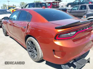 2020 Dodge Charger Scat Pack z VIN 2C3CDXGJ7LH223858, wystawiony jako IAAI lot #42221044 z przebiegiem 42 561 mil mil oraz . Historia ofert i sprzedaży dostępna na DreamBid. Obrazek 3.