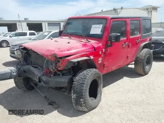 2015 Jeep Wrangler Unlimited Willys Wheeler with VIN 1C4BJWDG9FL750505, listed as a IAAI auction lot 41781762 with 139,000 mi miles and . Bid and sale history available at DreamBid. Image 2.