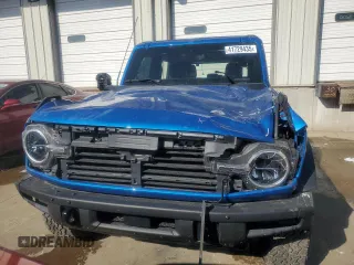 2023 Ford Bronco z VIN 1FMEE5BP9PLC15220, wystawiony jako Copart lot #41729435 z przebiegiem 10 855 mil mil oraz Szkoda całkowita • Salvage title. Historia ofert i sprzedaży dostępna na DreamBid. Obrazek 5.
