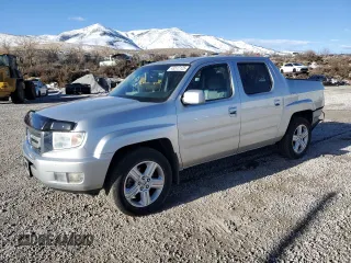 2010 Honda Ridgeline RTL z VIN 5FPYK1F52AB011291, wystawiony jako Copart lot #45512125 z przebiegiem 166 036 mil mil oraz Szkoda całkowita • Salvage title. Historia ofert i sprzedaży dostępna na DreamBid. Obrazek 1.