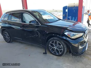 2021 BMW X1 sDrive28i with VIN WBXJG7C02M5S59010, listed as a IAAI auction lot 41933532 with 49,207 mi miles. Bid and sale history available at carsss.com. Image 13.