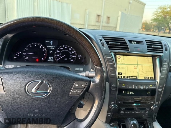 2009 Lexus LS 460 with VIN JTHCL46F795001457, listed as a Copart auction lot 55901025 with 148,490 mi miles and Salvage Title. Bid and sale history available at DreamBid. Image 9.