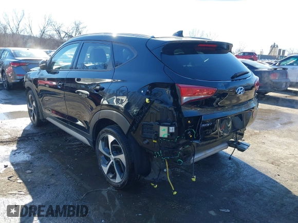 2018 Hyundai Tucson Sport with VIN KM8J33ALXJU771481, listed as a IAAI auction lot 41399335 with 64,905 mi miles. Bid and sale history available at carsss.com. Image 3.