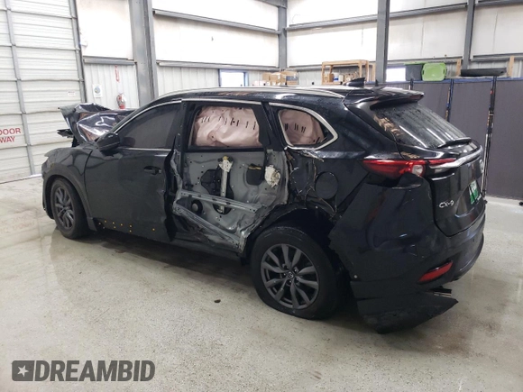 2021 Mazda CX-9 Touring with VIN JM3TCACY4M0523188, listed as a Copart auction lot 48595205 with 99,999 mi miles and Clean title. Bid and sale history available at DreamBid. Image 2.