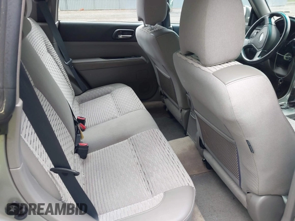 2005 Subaru Forester XS with VIN JF1SG65605H745494, listed as a IAAI auction lot 42382364 with 256,505 mi miles and . Bid and sale history available at DreamBid. Image 8.