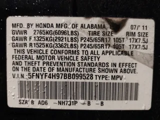 2011 Honda Pilot Touring with VIN 5FNYF4H97BB099528, listed as a IAAI auction lot 41721800 with 132,979 mi miles. Bid and sale history available at carsss.com. Image 9.