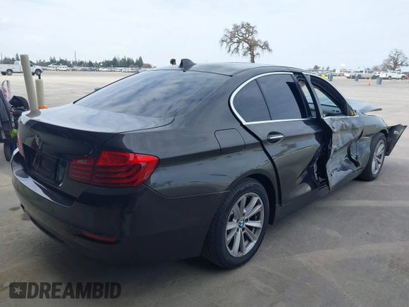 2014 BMW 5 Series 528i with VIN WBA5A5C52ED503033, listed as a IAAI auction lot 41562997 with 127,564 mi miles. Bid and sale history available at carsss.com. Image 4.