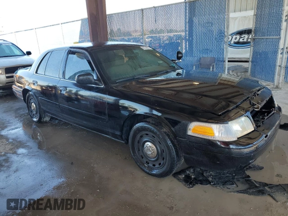 2003 Ford Police Interceptor Street Appear with VIN 2FAHP71W63X181563, listed as a Copart auction lot 43734574 with 195,534 mi miles and Salvage title. Bid and sale history available at DreamBid. Image 4.