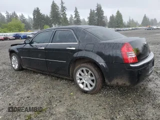2005 Chrysler 300 C z VIN 2C3JA63H75H570025, wystawiony jako Copart lot #57563115 z przebiegiem 82 181 mil mil oraz Szkoda całkowita • Salvage title. Historia ofert i sprzedaży dostępna na DreamBid. Obrazek 2.