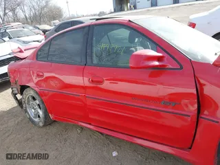 2002 Pontiac Grand Am GT with VIN 1G2NW52E52C174257, listed as a IAAI auction lot 41797928 with 250,020 mi miles. Bid and sale history available at carsss.com. Image 14.