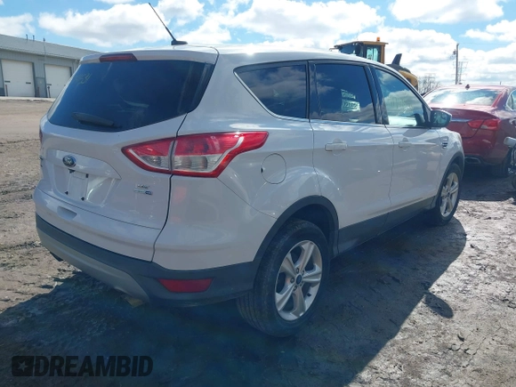 2015 Ford Escape SE with VIN 1FMCU9GX5FUB15747, listed as a IAAI auction lot 41741531 with 95,027 mi miles. Bid and sale history available at carsss.com. Image 4.