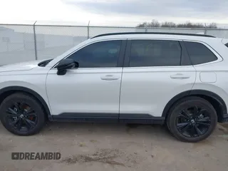 2025 Honda CR-V Sport Touring with VIN 7FARS6H9XSE043583, listed as a IAAI auction lot 41705098 with 6,020 mi miles and . Bid and sale history available at DreamBid. Image 14.