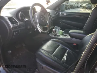 2018 Jeep Grand Cherokee High Altitude with VIN 1C4RJFCG3JC488022, listed as a Copart auction lot 87700385 with 94,390 mi miles and Salvage title. Bid and sale history available at DreamBid. Image 7.