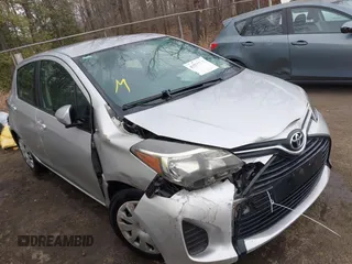 2015 Toyota Yaris L with VIN VNKKTUD33FA028588, listed as a IAAI auction lot 41575230 with 148,071 mi miles. Bid and sale history available at carsss.com. Image 1.