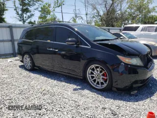 2014 Honda Odyssey Touring with VIN 5FNRL5H97EB016624, listed as a Copart auction lot 53444645 with 244,126 mi miles and Salvage Title. Bid and sale history available at DreamBid. Image 4.
